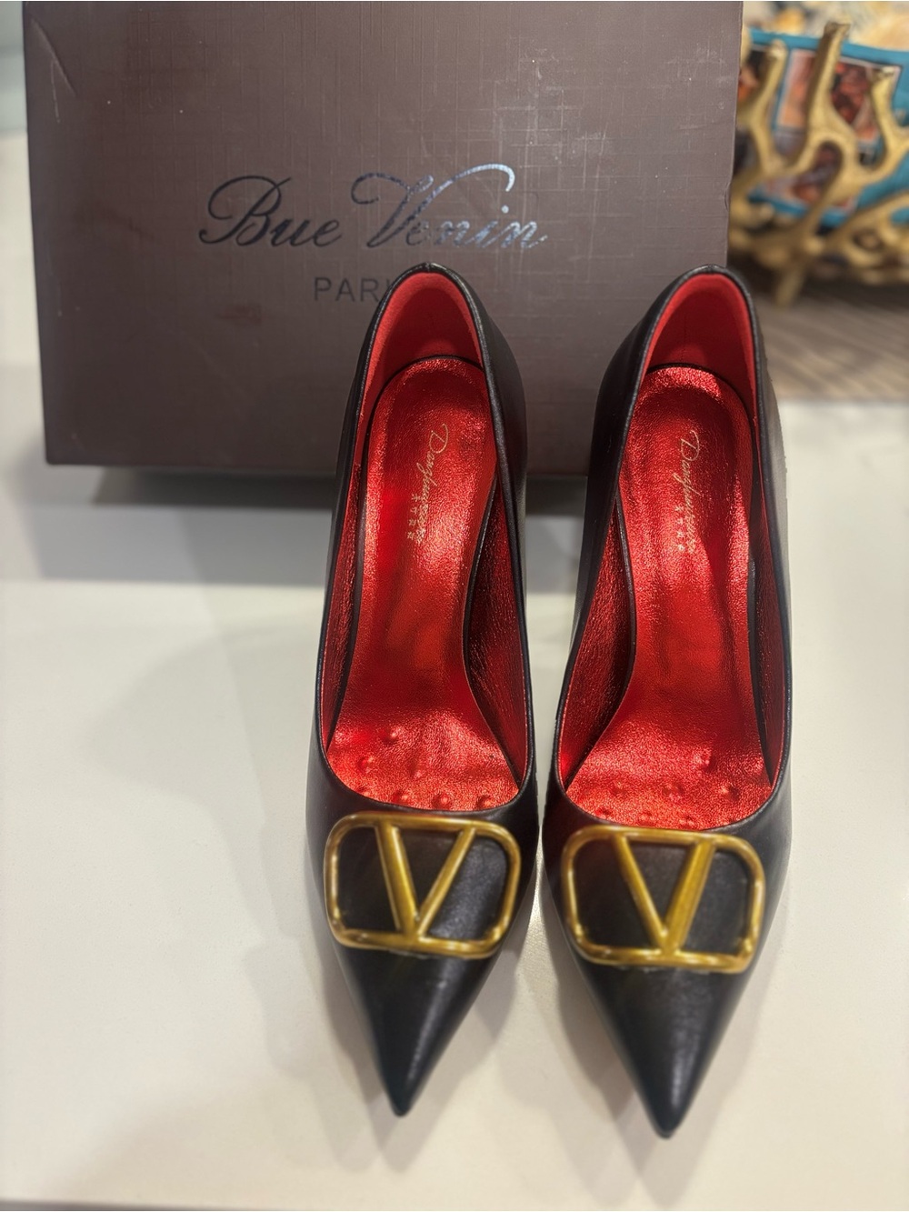 Black Pointed Toe Pumps with Gold Accent Valentino buckle